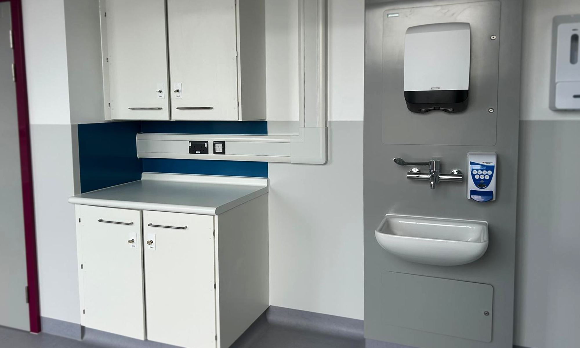 [PLACEHOLDER: confirm location/project] IPS panelling and sink installation in a clinical washroom